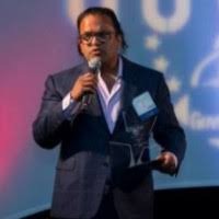 Deepak Jain, founder and CEO of AiNET — monogram portrait placeholder