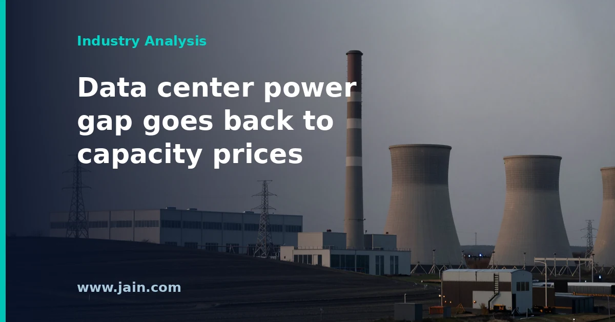 Power transmission lines feeding a large data center campus, illustrating FERC's rejection of PJM's data center curtailment plan